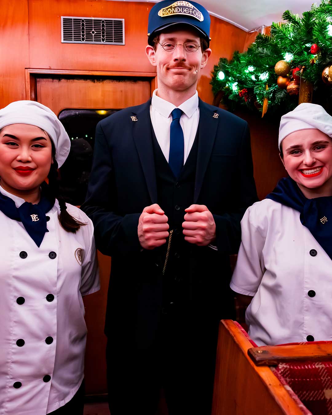 chefs and conductor at the polar express train ride