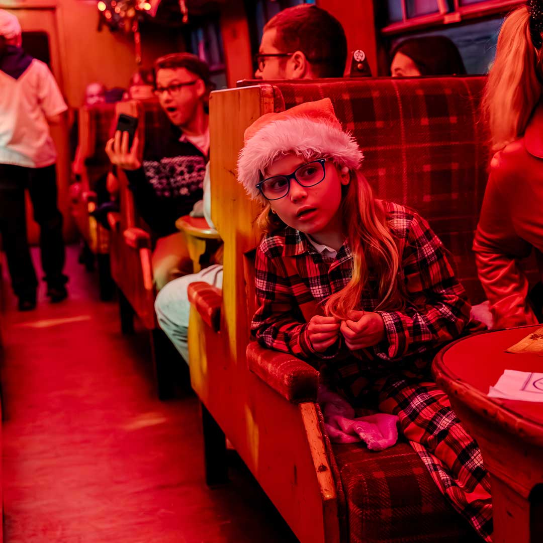child on board the polar express train ride